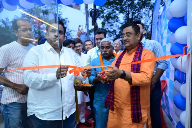 A ribbon-cutting moment celebrates the pharmacy's opening. — Gola Road