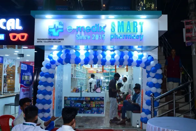 The illuminated sign and balloon arch welcome evening visitors. — Gola Road