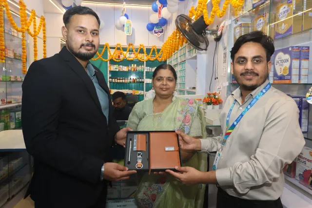 A commemorative presentation marks a shared milestone. — Mohanpur, Samastipur