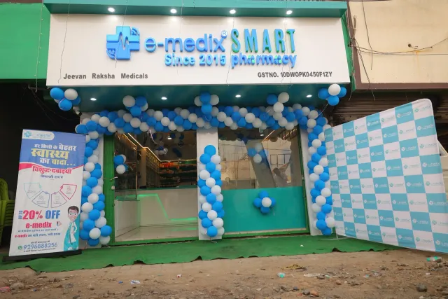 A bright green entrance and balloon decorations welcome visitors. — Kahalgaon, Bhagalpur