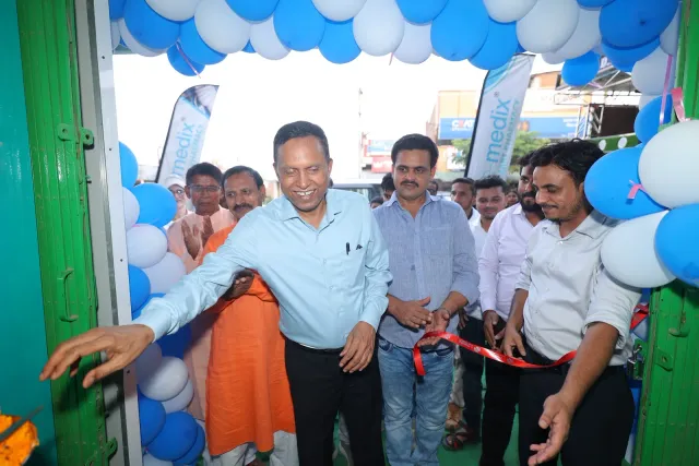 Guests celebrate the opening at the pharmacy entrance. — Kahalgaon, Bhagalpur