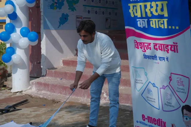 A final sweep at the entrance shows the care behind the preparations. — Parsagarh Bazar