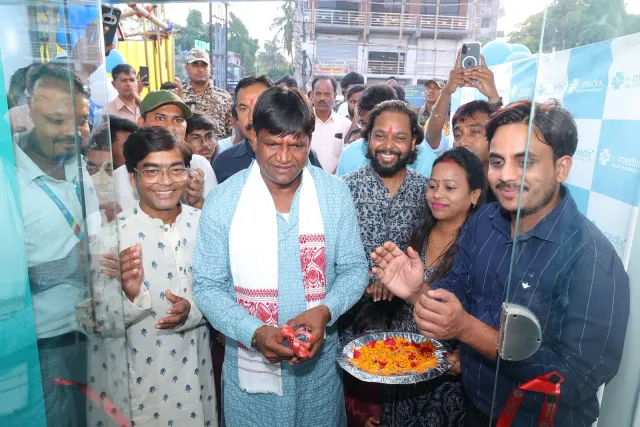 Guests gather at the doorway to celebrate the opening. — Bartand, Dhanbad