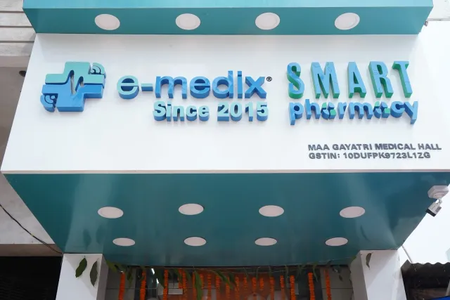 The e-medix sign gives the pharmacy a familiar neighbourhood presence. — Godhna Road