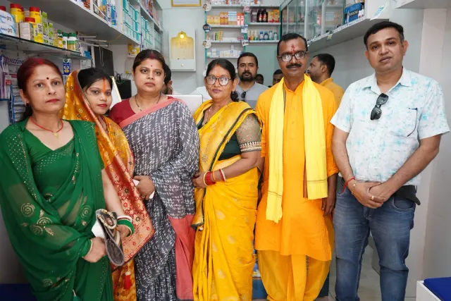 Guests come together for a colourful opening-day group photograph. — Godhna Road