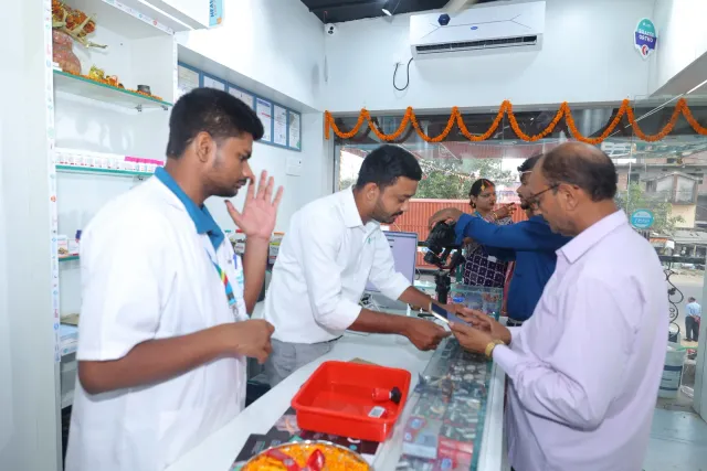 Sharing refreshments adds warmth to the opening-day gathering. — Simrahi Bazar
