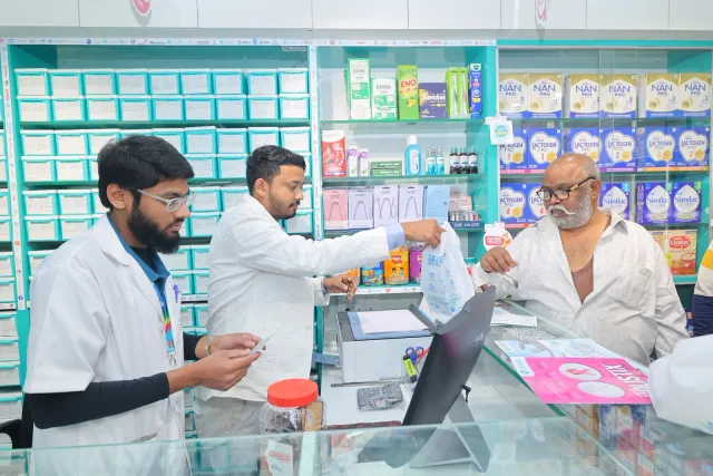 A candid glimpse of the team handling items behind the counter. — Sakchi, Jamshedpur