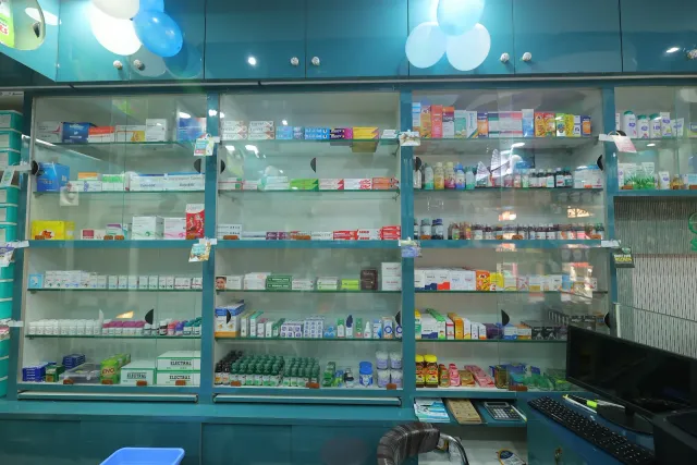 A closer look at the pharmacy's glass-fronted display shelves. — Choti Kalyani, Muzaffarpur