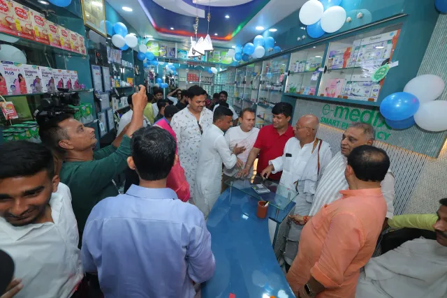The opening brings visitors together inside the pharmacy. — Choti Kalyani, Muzaffarpur
