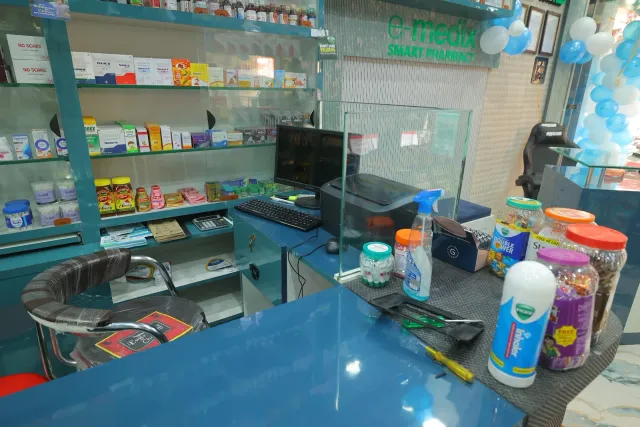 A closer view of the computer station and everyday counter setup. — Choti Kalyani, Muzaffarpur