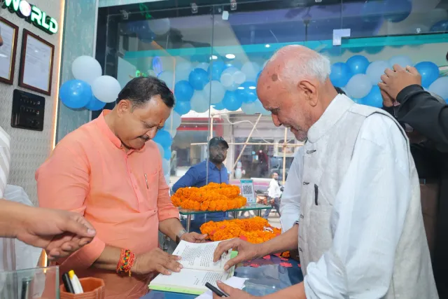 The opening ribbon brings guests together at the entrance. — Choti Kalyani, Muzaffarpur
