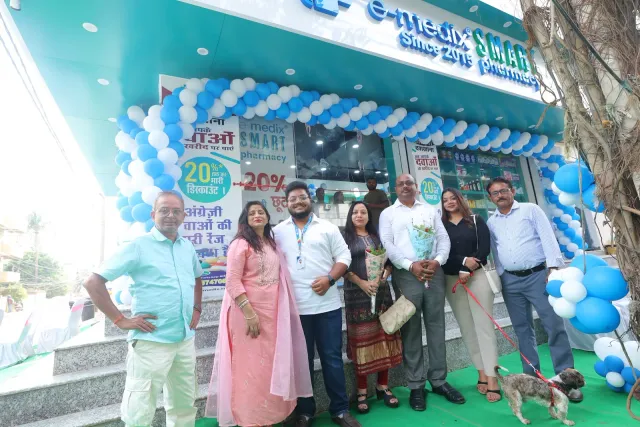 Guests celebrate a new beginning at the decorated entrance. — Malahi Pakri, Patna