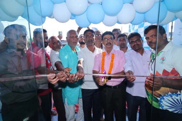 Guests come together for the opening ribbon-cutting. — Gomia