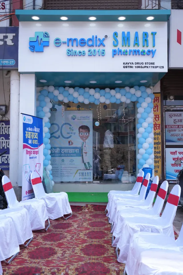 Opening-day seating and balloons create a welcoming approach to the pharmacy. — Changar More Bypass
