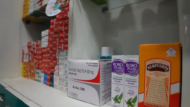 A closer view of the store's shelf displays. — Jamalpur, Munger