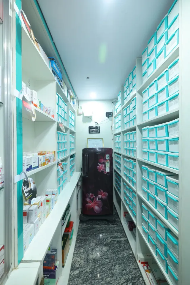 A view along the pharmacy's aqua storage aisle. — Jamalpur, Munger