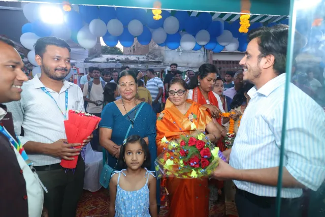 Flowers and warm smiles mark the opening celebrations. — Jamalpur, Munger