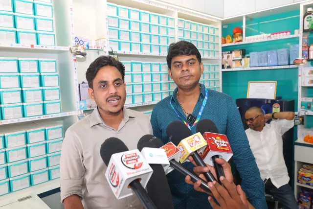 Guests share the occasion with local media inside the pharmacy. — Tribhuvan More