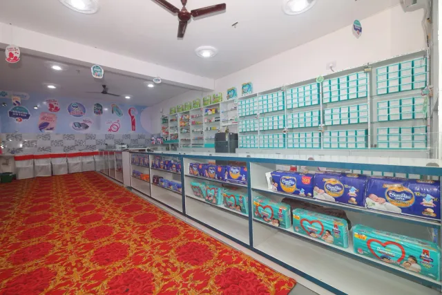 A wide view across the pharmacy's bright counters and shelves. — Sonari, Jamshedpur