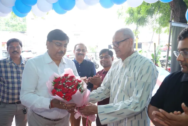 A bouquet presentation welcomes guests to the celebrations. — Sonari, Jamshedpur