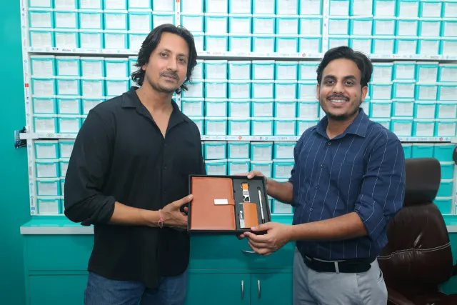 A commemorative presentation adds to the celebrations. — Ashiana Nagar