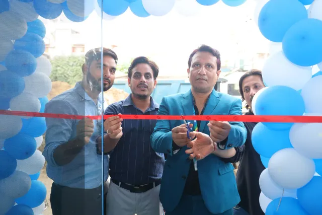 The opening ribbon marks a shared new beginning. — Ashiana Nagar