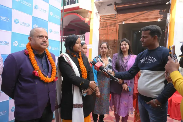 Guests share the occasion with local media outside the pharmacy. — Ramdayalu