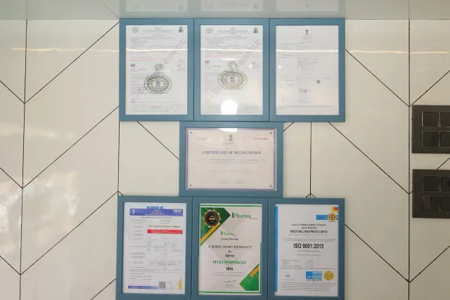 Framed certificates add detail to the pharmacy interior. — Sirsiya, Giridih