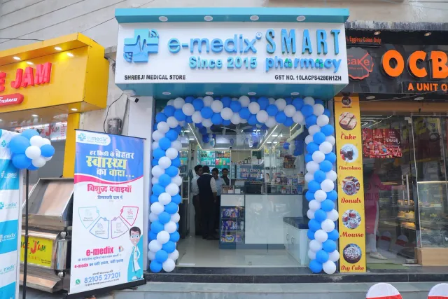 The Buddha Colony storefront welcomes visitors with blue-and-white balloons. — Buddha Colony