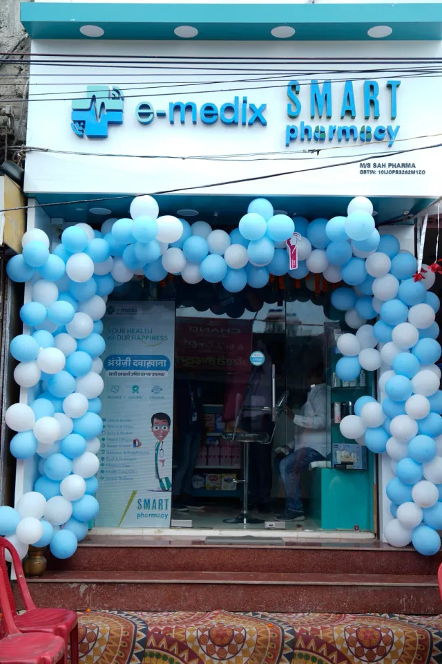 Blue-and-white balloons welcome visitors to the Raxaul pharmacy. — Raxaul