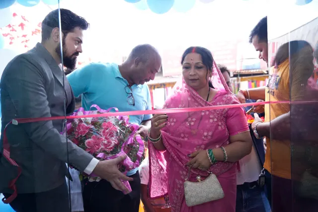A ribbon-cutting moment brings guests together at the entrance. — Raxaul